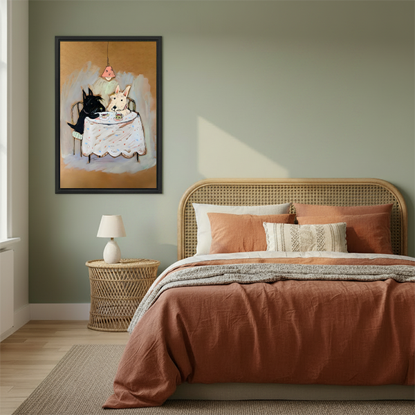 Black-framed terrier tea party canvas wall art between leafy plants, featuring two dogs and teacups against warm ochre.