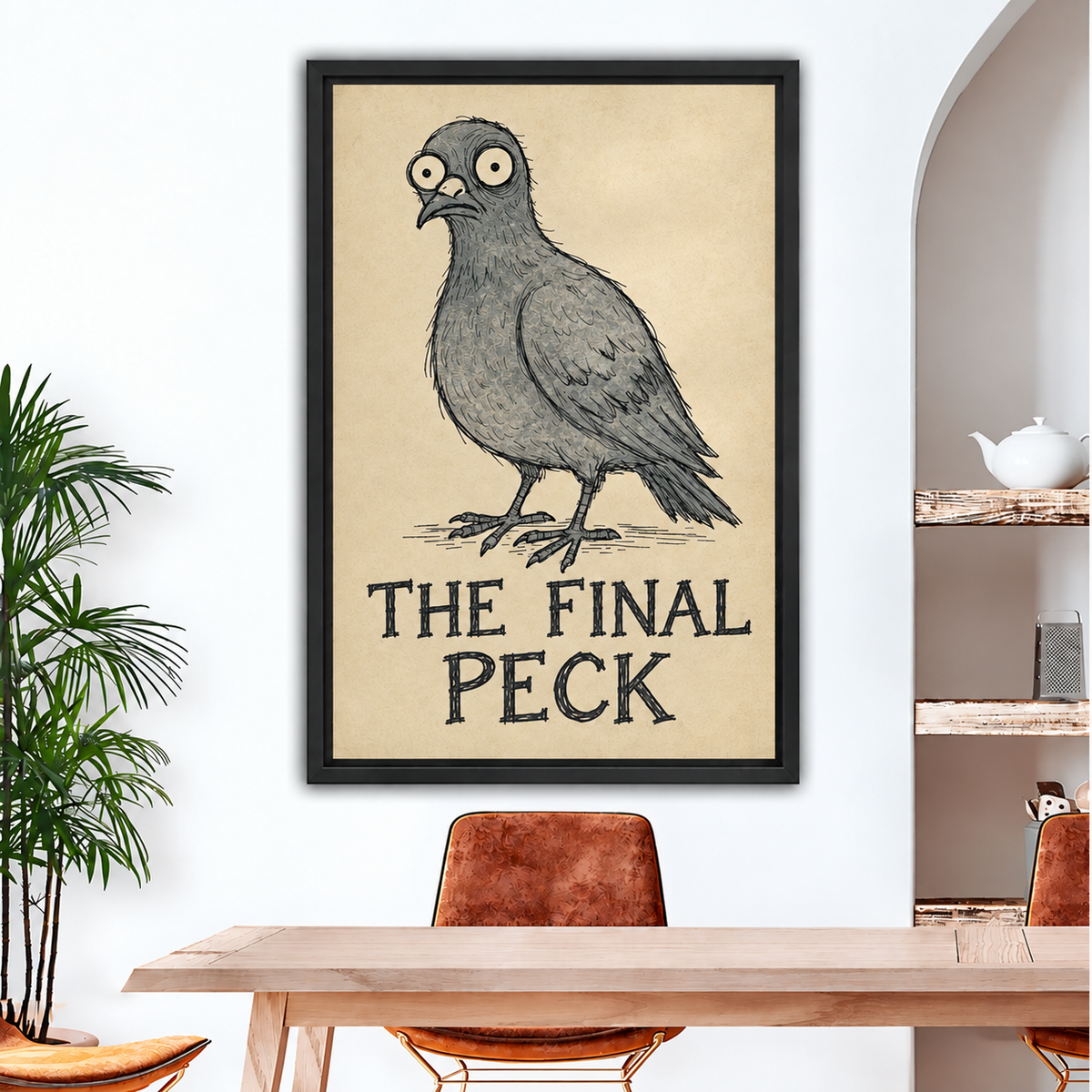 Black-framed The Final Peck pigeon canvas wall art hanging above a dining table beside an arched shelving alcove.⠋