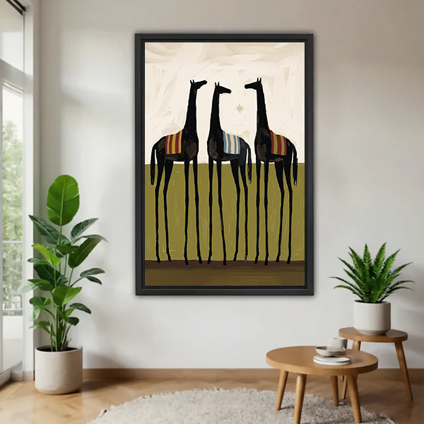 Black-framed three black horses canvas wall art with striped saddle blankets, displayed between potted plants.