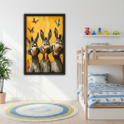 Playful framed wall art of three grinning donkeys with a carrot and butterflies on a sunny yellow background, hung in a children's bedroom with bunk beds