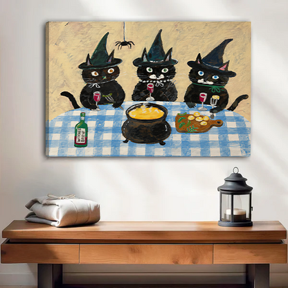 Three witch cats canvas wall art in a black frame above a bed with white bedding and wooden headboard.