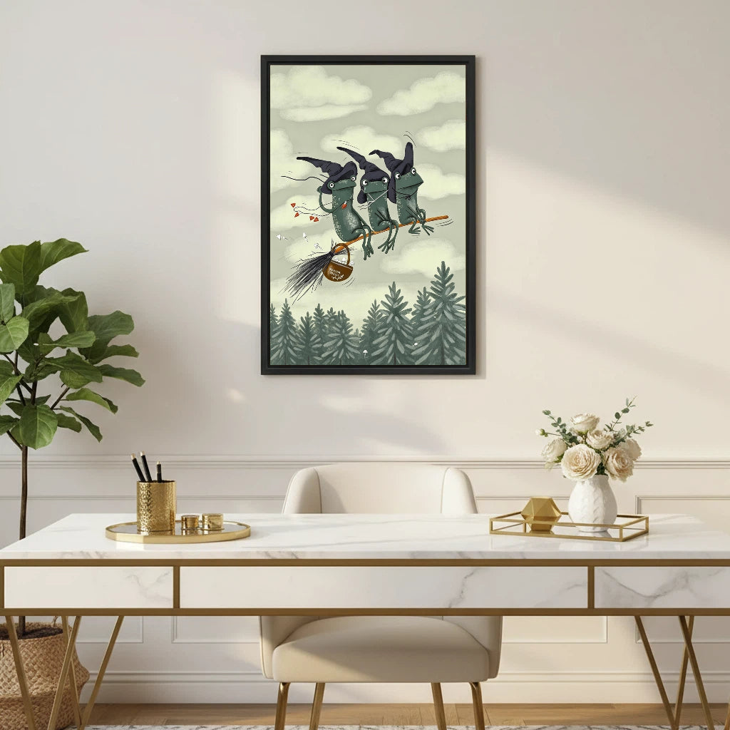 Fantasy witch frogs on broomstick framed canvas wall art displayed above marble desk in elegant gold home office