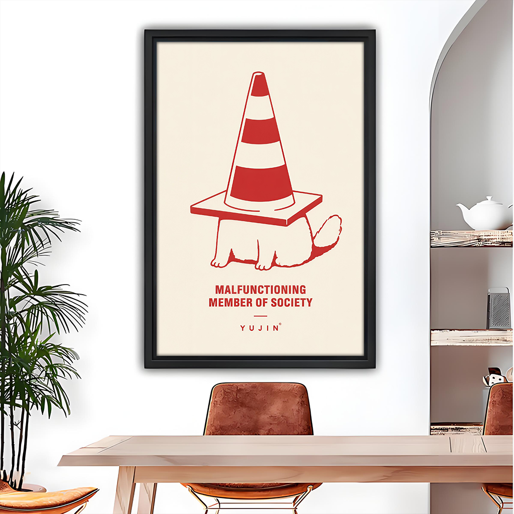 Traffic cone cat canvas wall art in a black frame beside wooden bunk beds and a shelf of toys.
