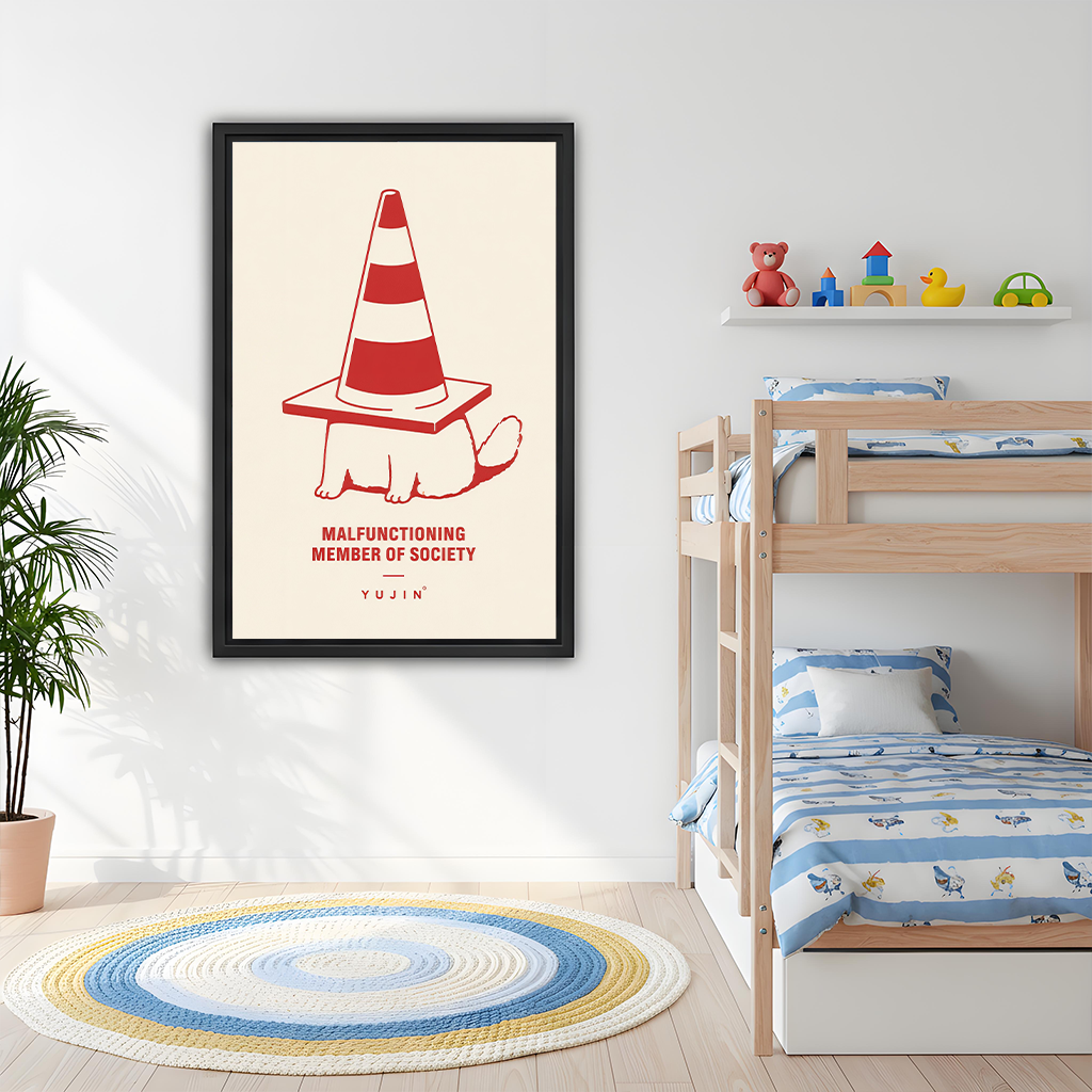 Minimalist traffic cone cat canvas wall art in a black frame above a gray sofa with blue and white cushions.