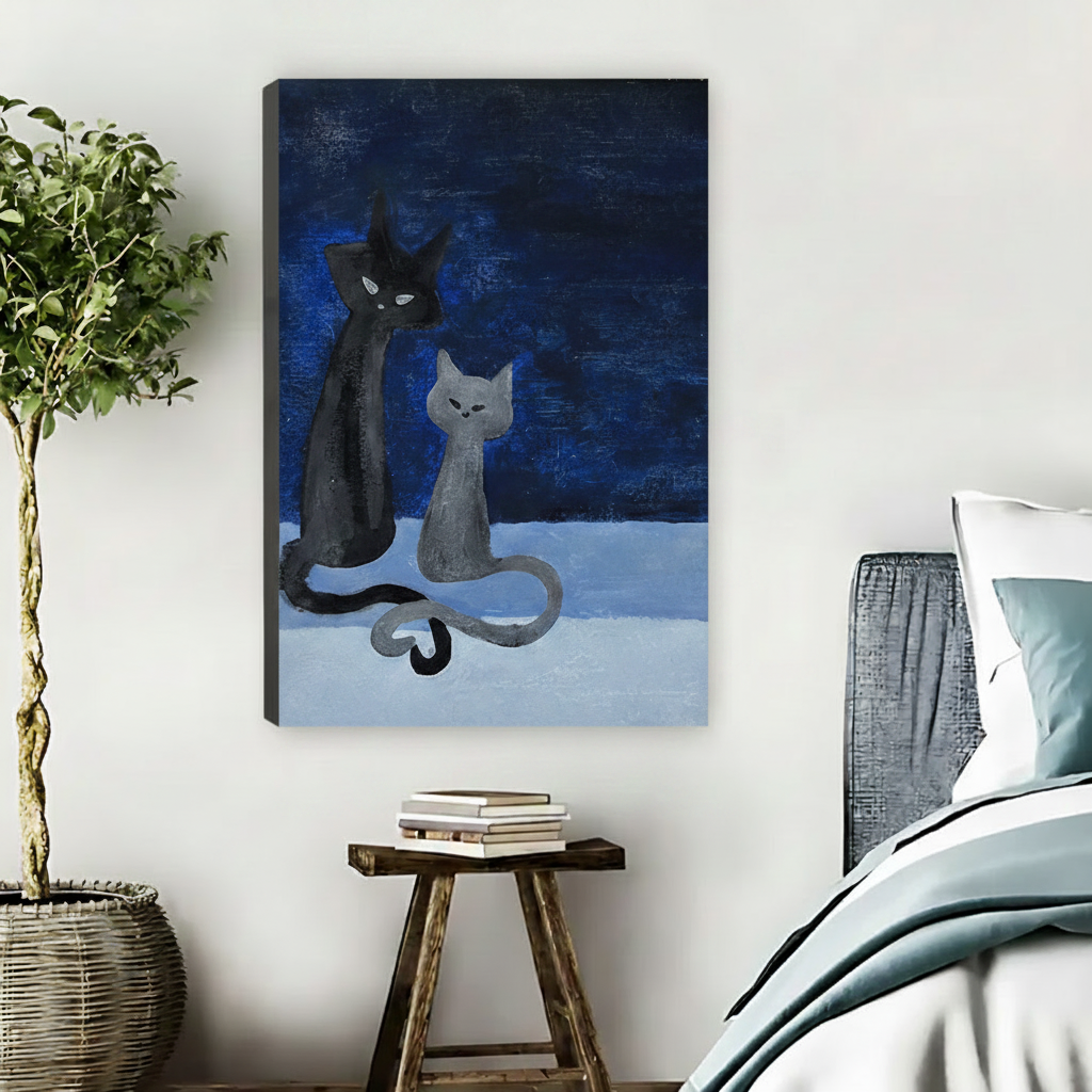 Whimsical two cats canvas wall art displayed in cozy bedroom beside plant and wooden stool