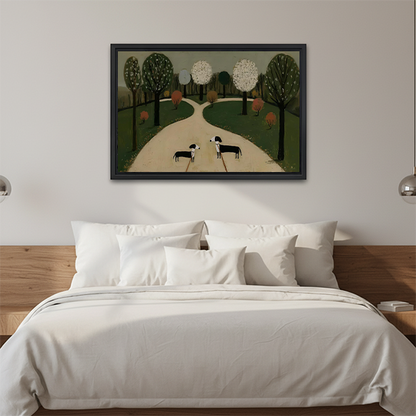 Woman holding black-framed two dogs park canvas wall art depicting two black-and-white dogs on a pale tree-lined path.