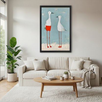 Two white birds canvas wall art in a black frame displayed between potted plants.