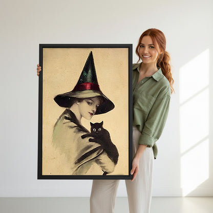 Woman holding large Victorian witch black cat vintage black framed canvas size reference in white room
