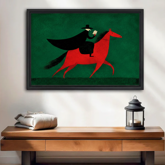 Vintage caped rider on red horse framed canvas wall art displayed above wooden console table in entryway