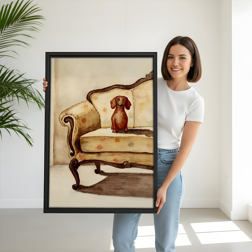 Woman holding a framed vintage dachshund sofa wall art print for size reference