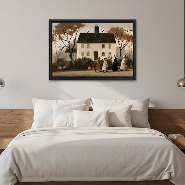 Vintage Halloween house wall art hangs above a wooden console beside a black lantern in a bright room.