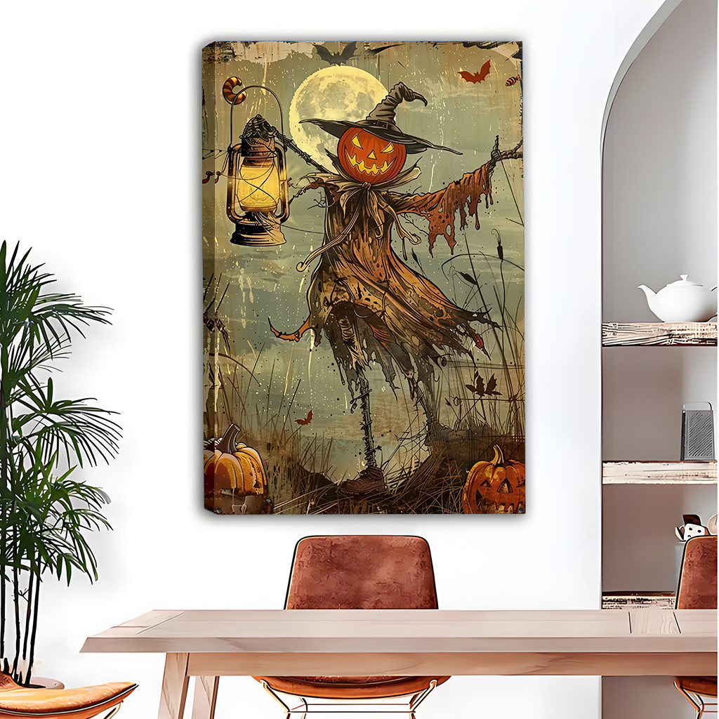 Woman holding black-framed pumpkin scarecrow canvas wall art featuring a witch hat, glowing lantern, and moonlit backdrop.