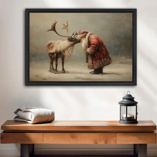 Vintage Santa and reindeer canvas wall art in a black frame above a wooden bench and lantern