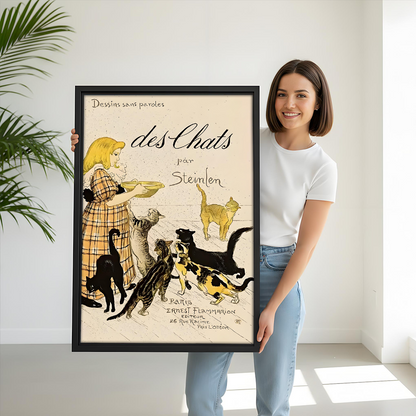 Woman holding a framed vintage Steinlen cat wall art print for size reference