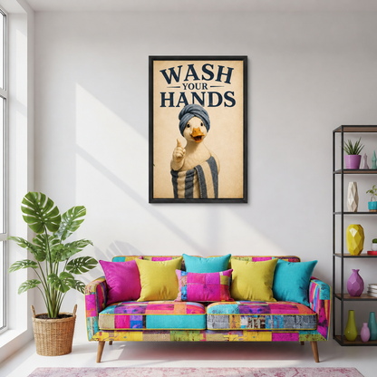 Framed wash your hands duck canvas wall art displayed above a colorful patchwork sofa in a living room.