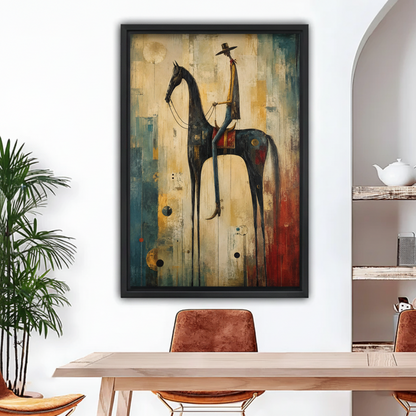 Framed black abstract western cowboy on horseback canvas with blue gold red tones above dining table