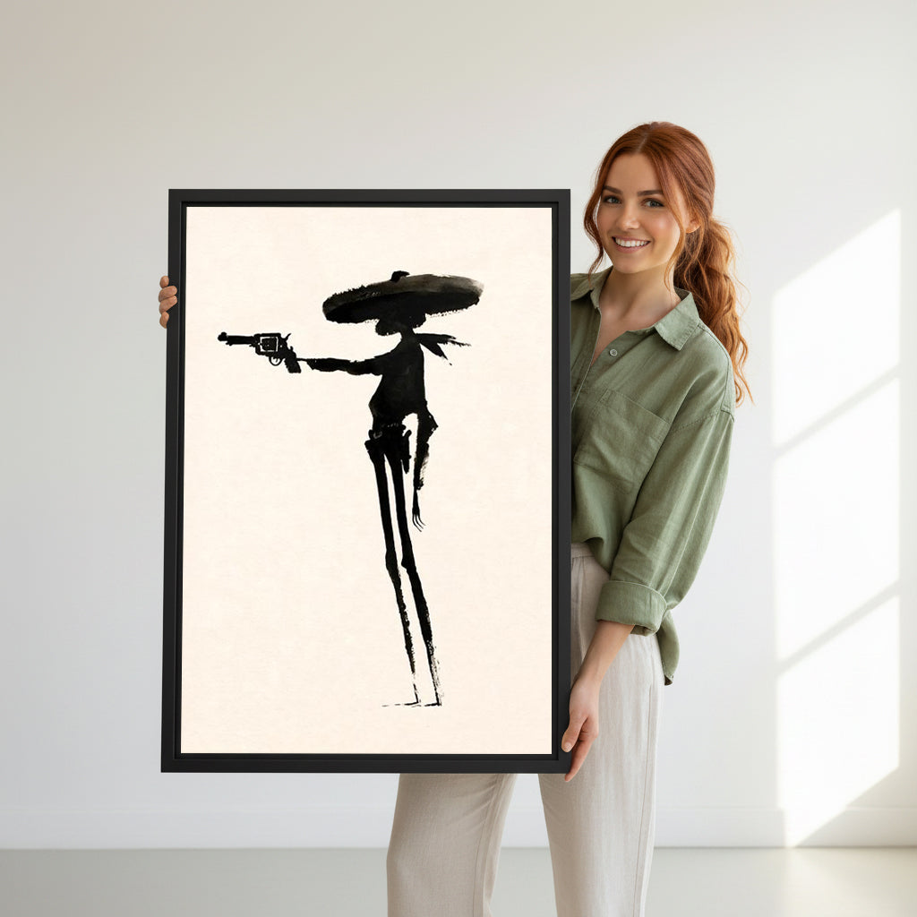 Woman holding black-framed western gunslinger canvas wall art against a light wall
