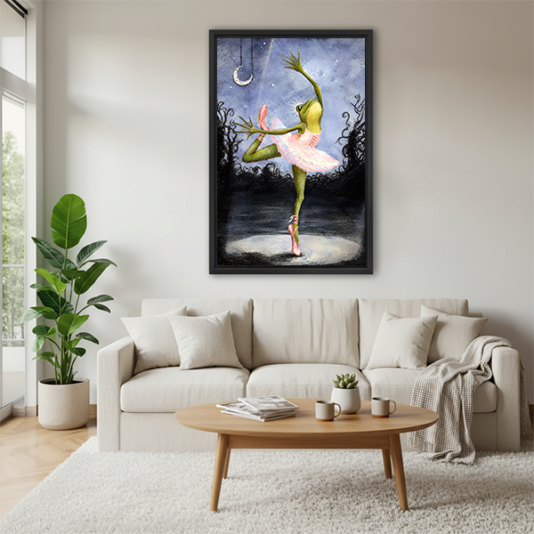 Gallery-wrap whimsical ballerina frog canvas wall art displayed between green plants in a bright living room