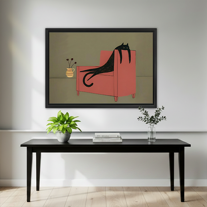 Black-framed whimsical black cat canvas wall art displayed above a black table with plants and stacked books.