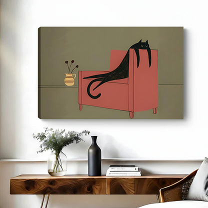 Framed whimsical black cat canvas wall art above a wooden console with flowers, books, and a black vase.
