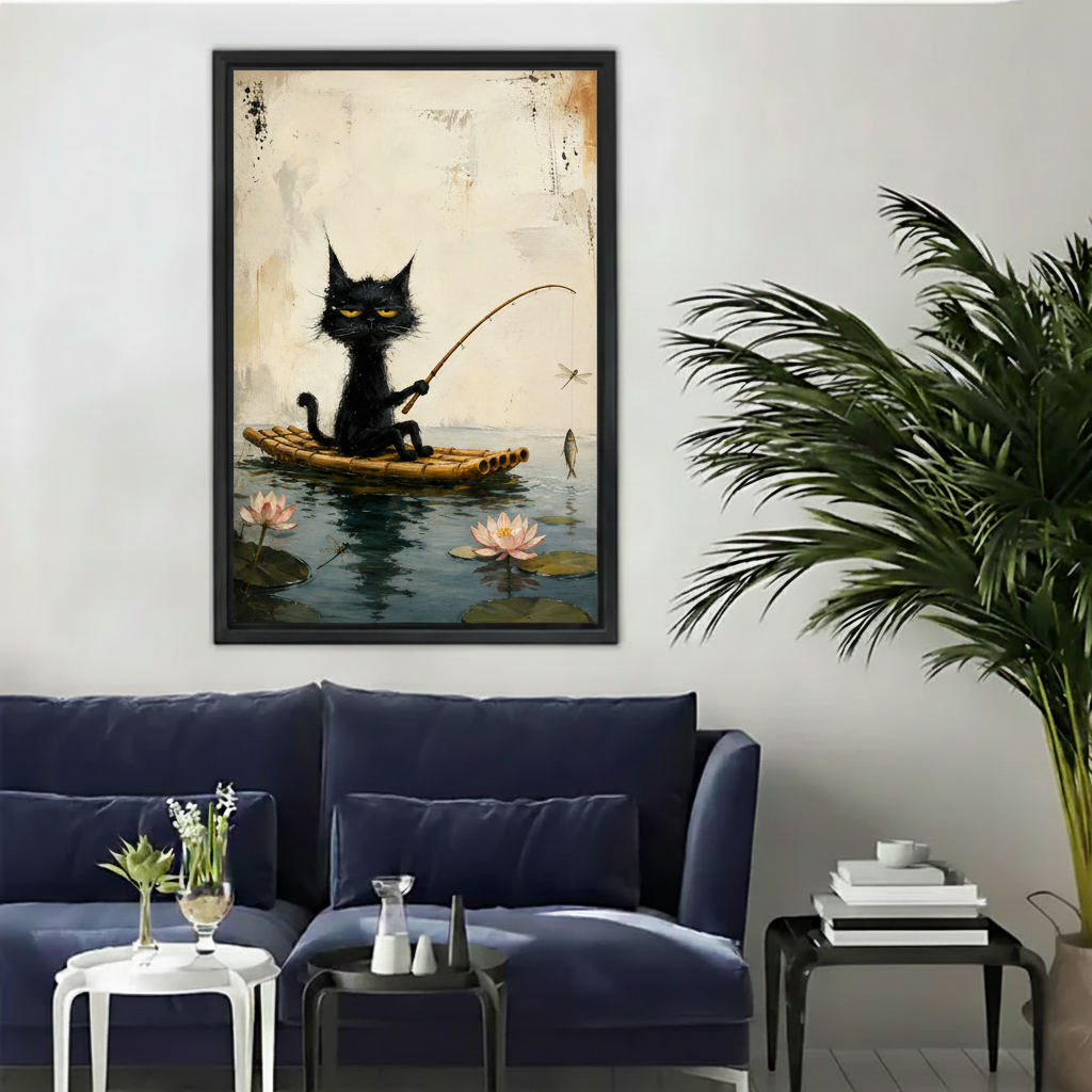 Whimsical black cat fishing on lotus pond framed canvas wall art in black frame above navy sofa in living room