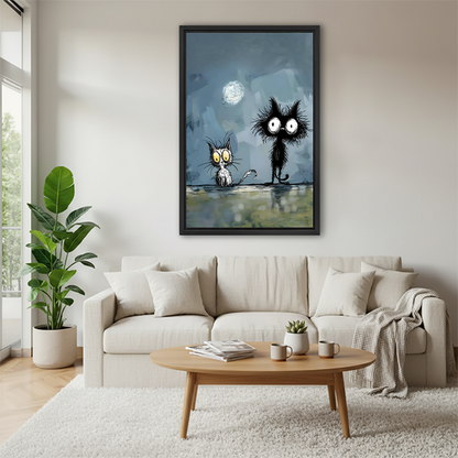 Smiling woman holding large black framed whimsical black cats moonlight canvas art print to show size