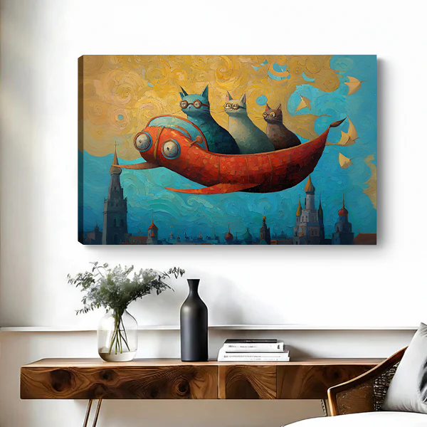 Canvas art print of three whimsical cats on a red flying fish soaring above fantasy castle spires in a golden blue sky, displayed above a wooden console table