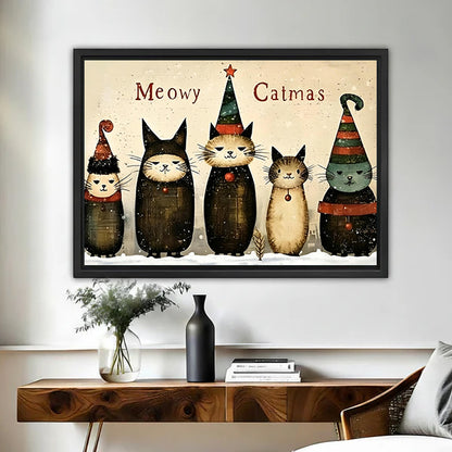 Framed Christmas cats canvas wall art above a walnut console with dried stems and a matte black vase
