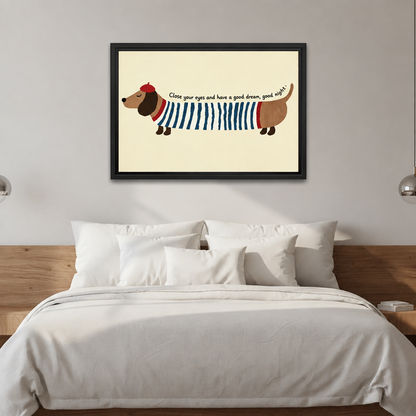 Black-framed whimsical dachshund wall art above a bed with white bedding and a wooden headboard.