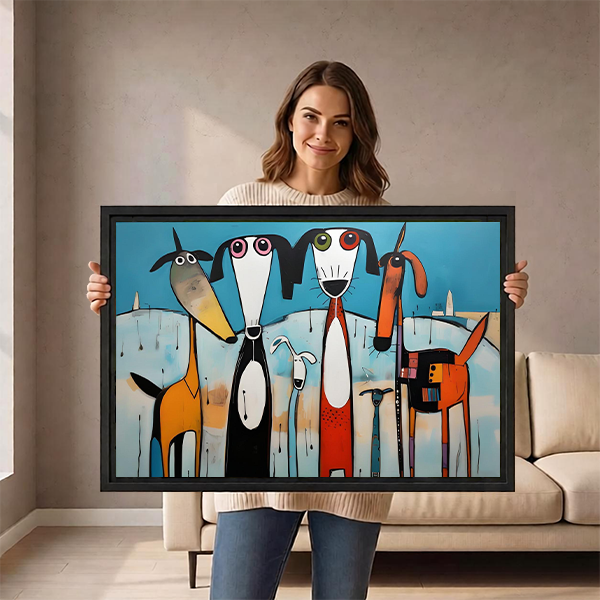 Woman holding a large framed whimsical dog wall art print showing scale and black frame detail
