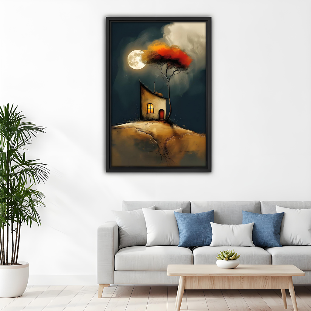 Framed whimsical moonlit cottage canvas wall art above white sofa in minimalist Scandinavian living room