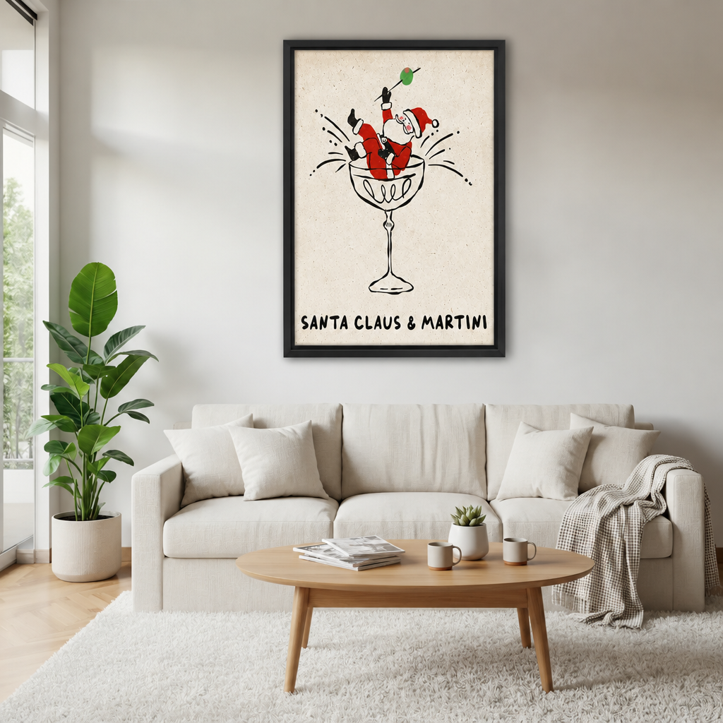 Whimsical Santa martini canvas wall art in a black frame above a cream sofa beside a wooden coffee table.