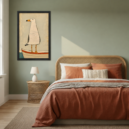 Framed whimsical seagull boat canvas wall art displayed above a rattan bed