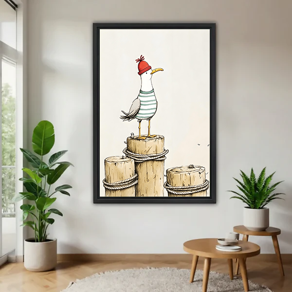 Black-framed whimsical seagull canvas wall art with a red hat and dock posts, displayed between leafy plants.