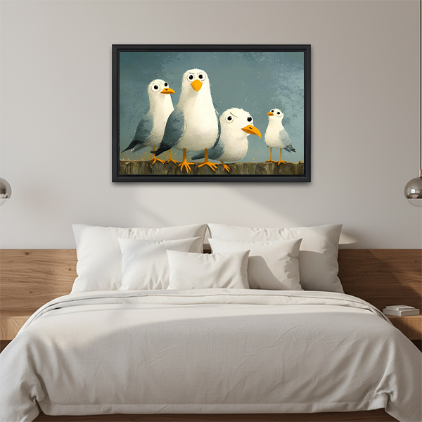 Whimsical seagulls canvas wall art in a black frame above a white bed with a wooden headboard.