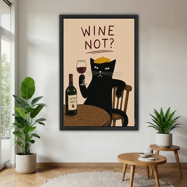 Wine not black cat gold beret wine glass bottle sandy background retro poster black framed canvas wall art on white wall beside large monstera plant and tiered round wood side table