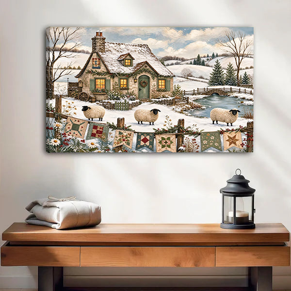 Gallery-wrap winter cottage sheep canvas wall art with visible left canvas edge above a wooden bench
