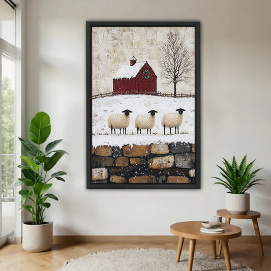 Black-framed winter sheep and red barn canvas wall art displayed between potted plants.