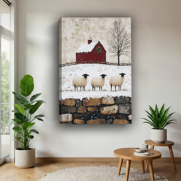 Gallery-wrap winter sheep and red barn canvas wall art in a bright corner beside plants