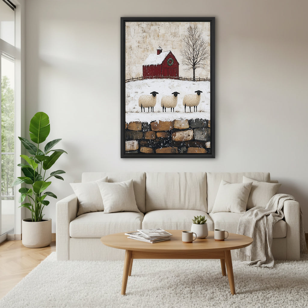 Winter sheep and red barn canvas wall art above a cream living room sofa
