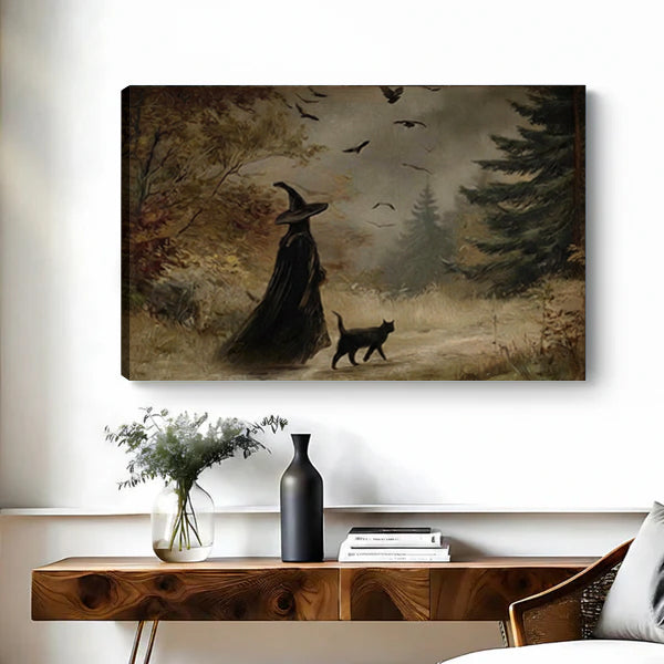 Dark folklore witch and black cat gallery wrap canvas wall art unframed on white wall above wood console with botanicals