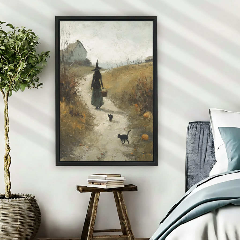  Back-view witch in tall hat carrying basket walking autumn country path with two black cats and pumpkins vintage oil painting framed wall art beside teal linen bed, cottagecore canvas for bedroom decor