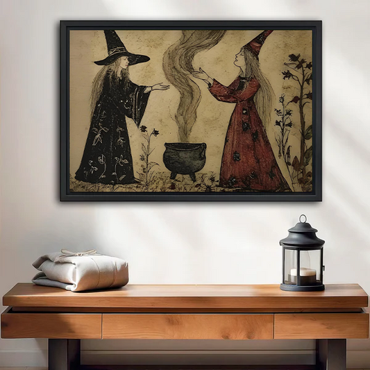 Witch cauldron canvas wall art with two spellcasters displayed above a wooden console and lantern in a bright room