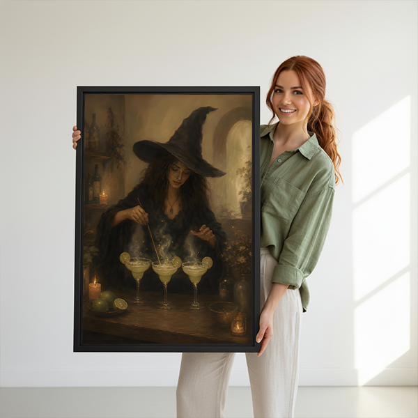 Woman holding a large framed witch cocktail canvas wall art to show its size in a bright room