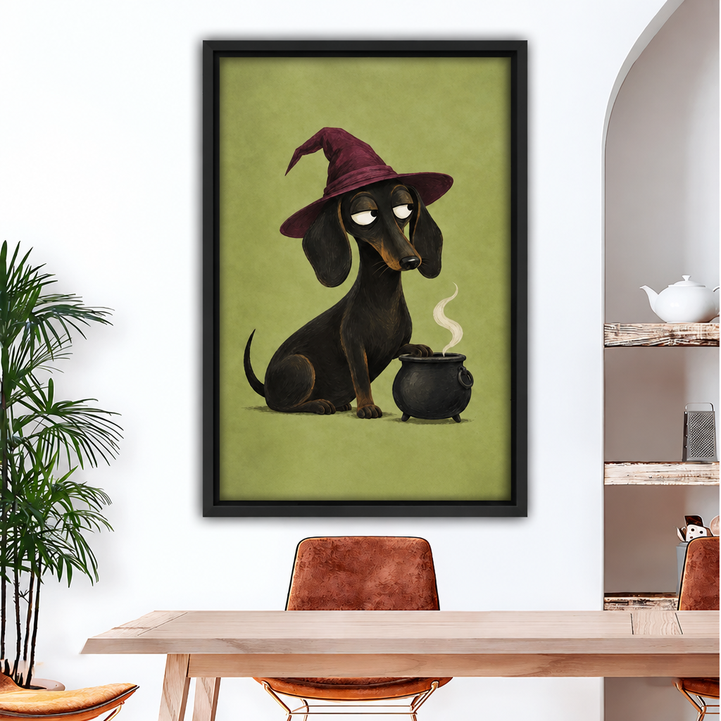 Black-framed witch dachshund canvas wall art hanging above a dining table beside an arched shelving alcove.