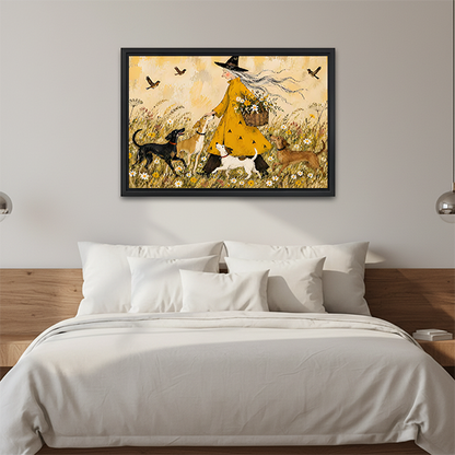 Framed witch and dogs canvas wall art with a yellow dress and flower-filled meadow above a cream sofa.