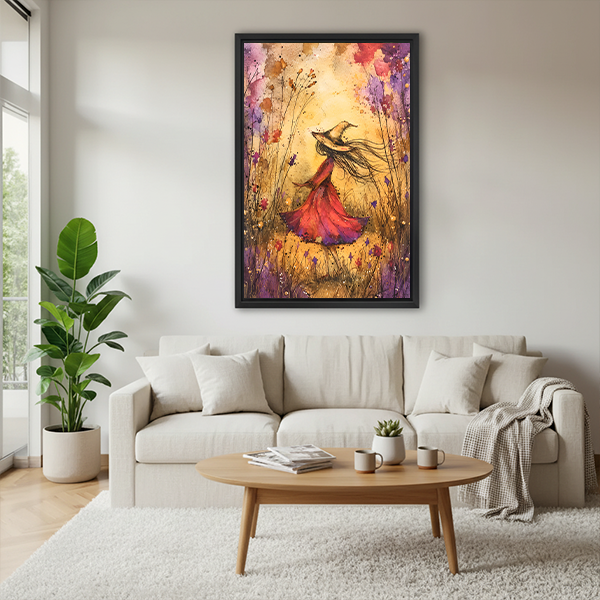 Witch in wildflowers canvas wall art in a black frame above a cream living room sofa.