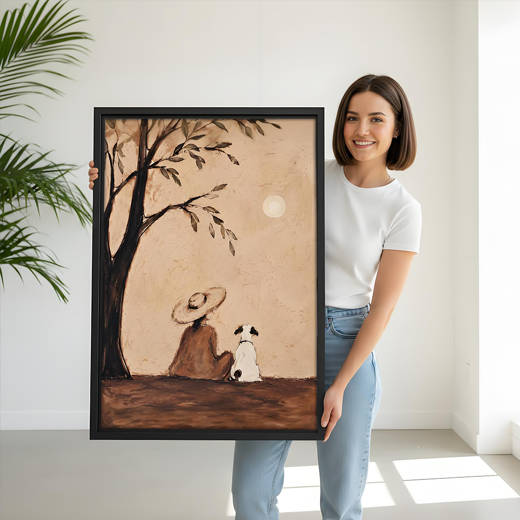 Smiling woman holding a large framed woman and dog under tree canvas wall art in a bright white room