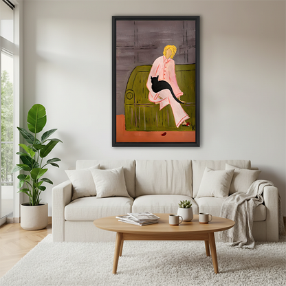 Framed woman with black cat canvas wall art beside a rattan bed with terracotta bedding in a green bedroom.