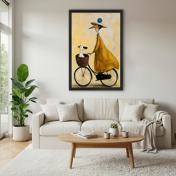 Gallery-wrap woman and dog bicycle canvas wall art showing a white dog in the front basket above wooden tables.